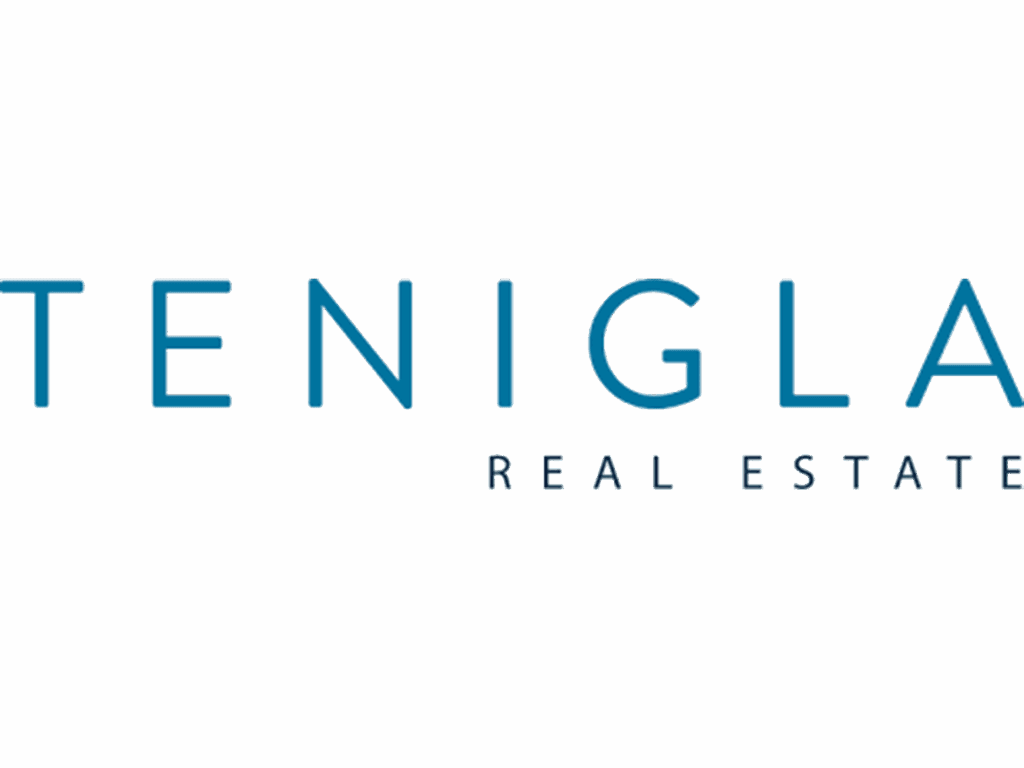 Logotipo de Tenigla Real Estate, agencia inmobiliaria asociada a Skor